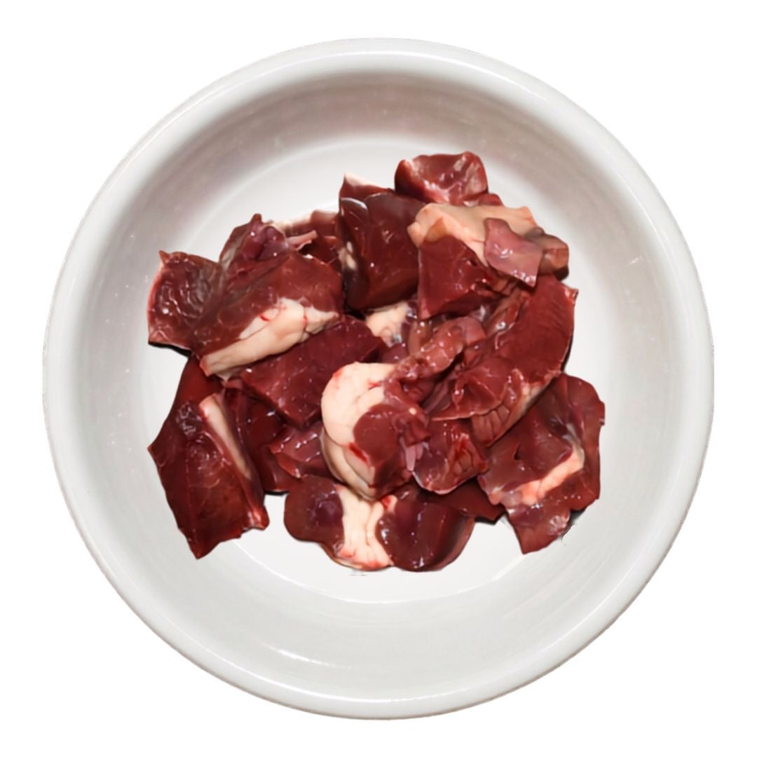 Diced raw beef heart in a bowl, raw dog food, Burleigh Bones Gold Coast.