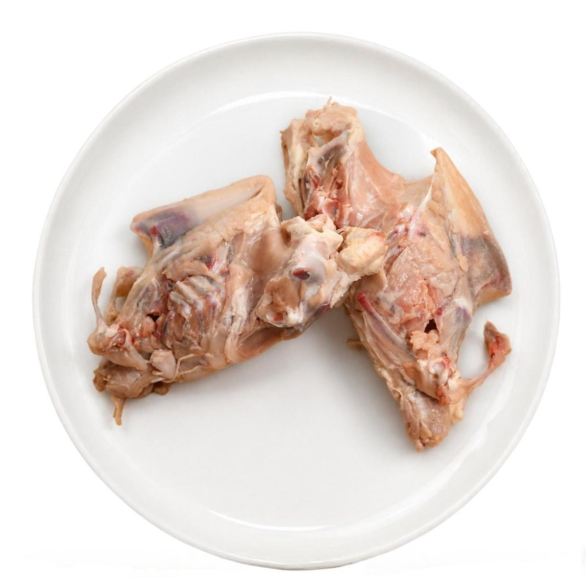 Raw chicken frames on a plate, raw dog food, Burleigh Bones Burleigh Heads.
