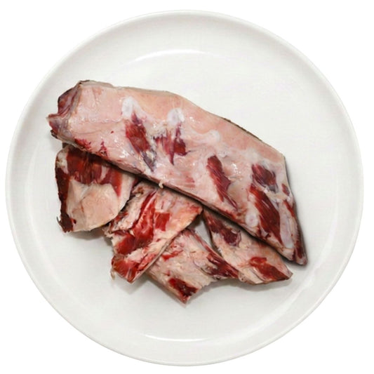 Raw cut brisket bones on a plate, raw dog food, Burleigh Bones Burleigh Heads.